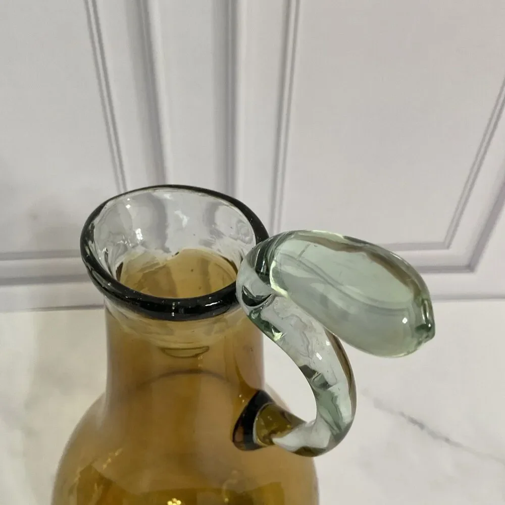 Hand Blown Glass Amber Pitcher with attached Clear Handle 10.5”Tall Clear Base